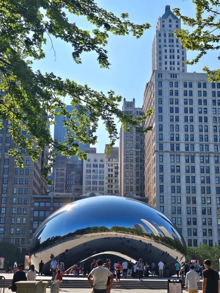 a large metal sculpture of a bean