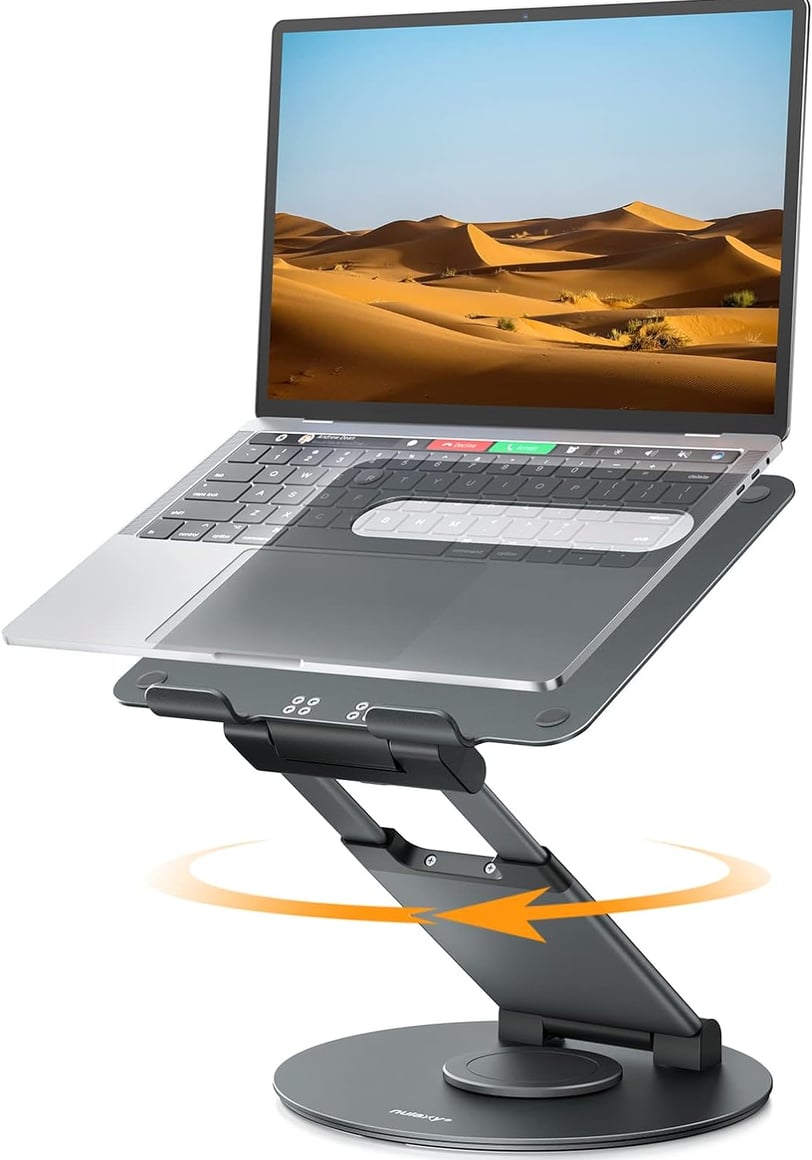 a laptop computer sitting on a stand with a laptop