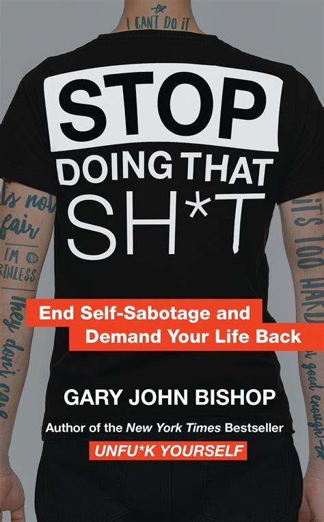 a man with tattoos on his back and a t - shirt that says stop doing