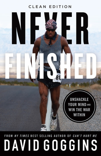 a man in a tank top running on a road