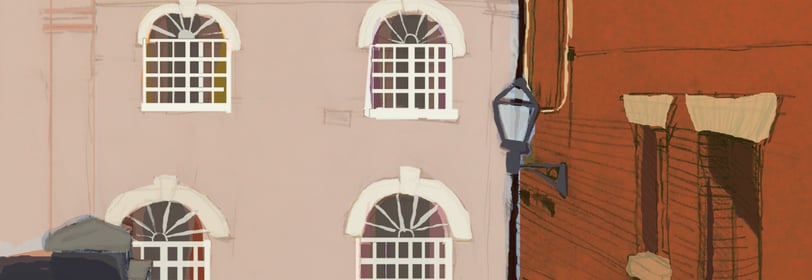 a street scene with a street light and a building