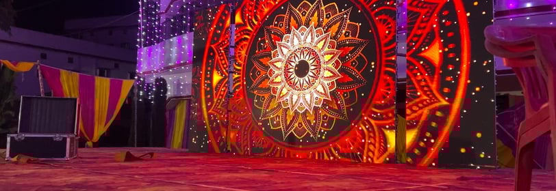 a stage with a large display of lights and decorations