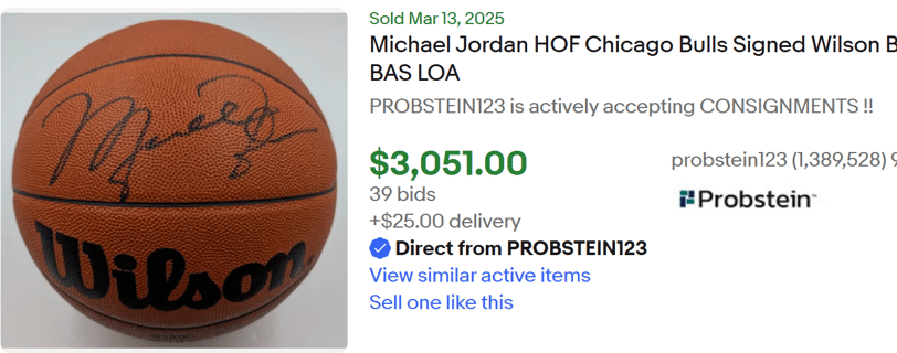 a michael jordan basketball ball with a signed signed basketball ball
