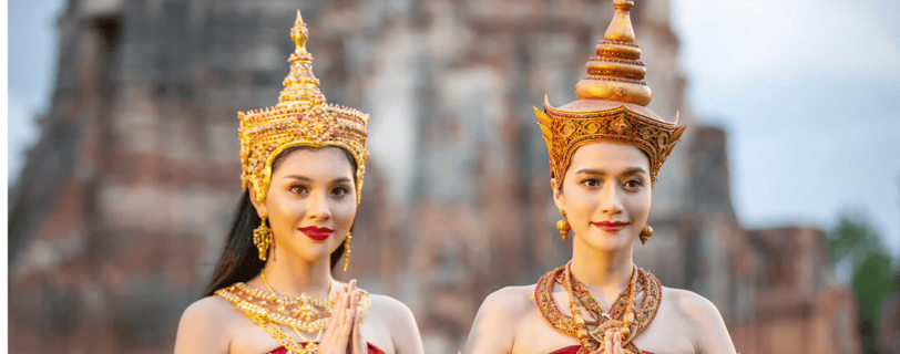 two women in traditional thai costumes