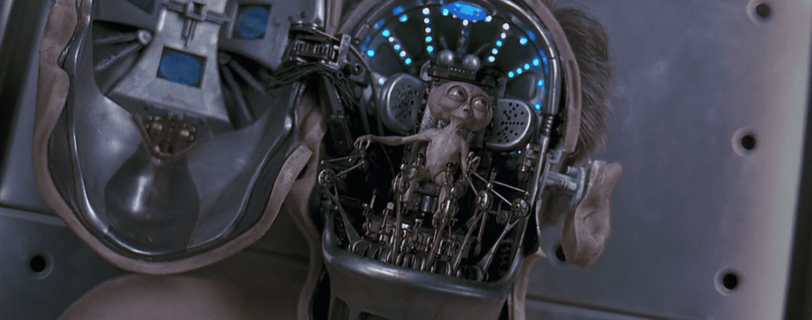Men in Black alien brain controller, symbolizing the concept of the human brain as an independent entity or flesh mech pilot