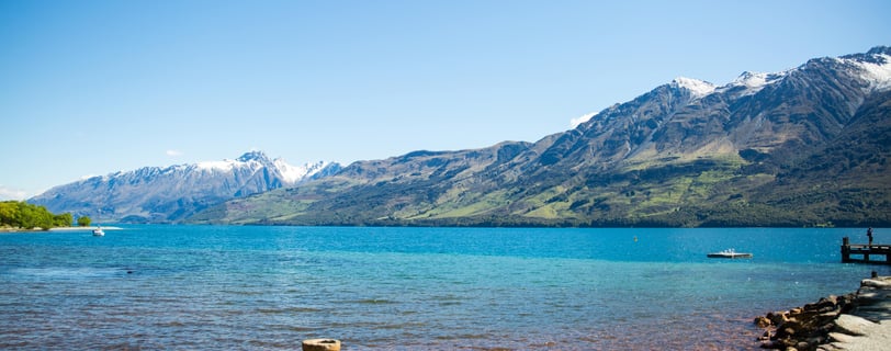 a lake with a boat in the water