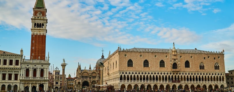 a large building with a clock tower in the middle of it