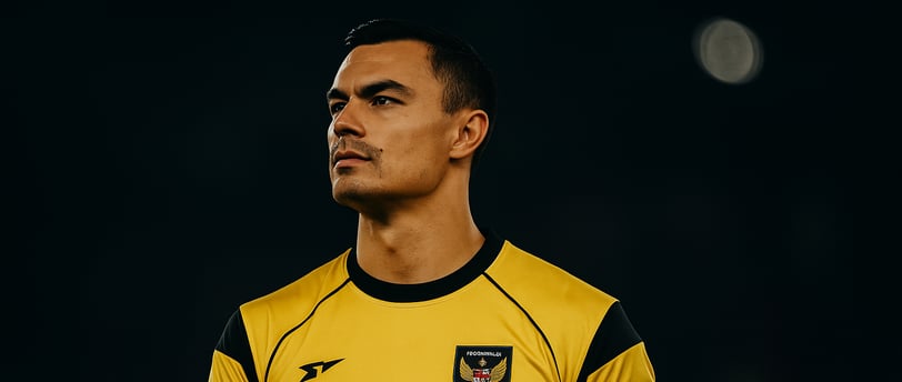 Emil Audero berdiri dengan tangan di dada mengenakan jersey kuning, latar belakang gelap dramatis