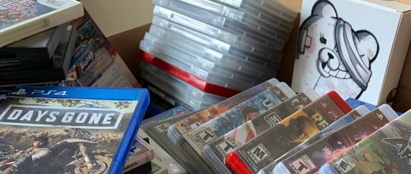 Backlog box full of video games.