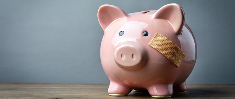 piggy bank with a bandaid for inflation affecting retirement