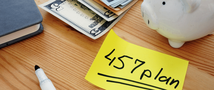 a marker some money and a piggy bank for 457b retirement