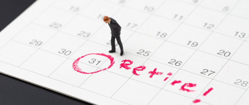 person looking at a calendar date that says when to retire with target date funds