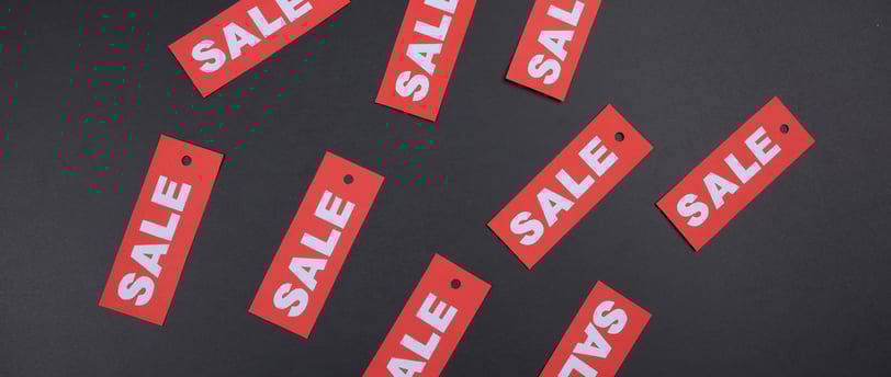 for sale labels symbolizing value investing