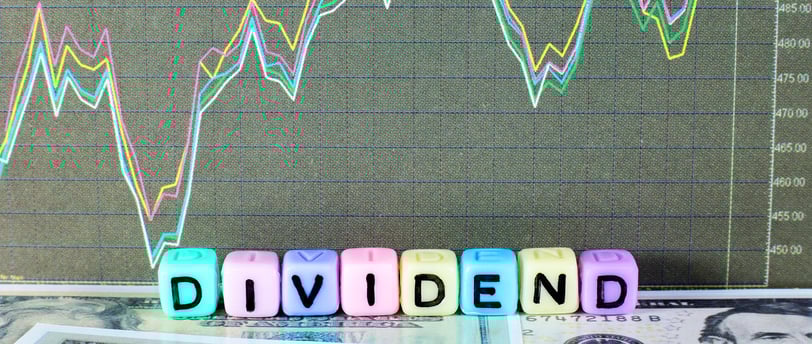 chart and dollar bills representing dividends