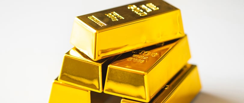 gold bullion bars in a pyramid