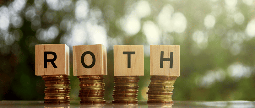 gold coins and blocks spelling roth ira