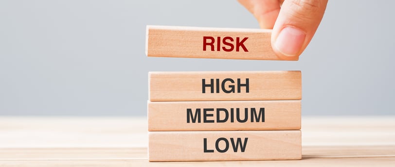 wooden blocks labeled with different risk tolerance levels