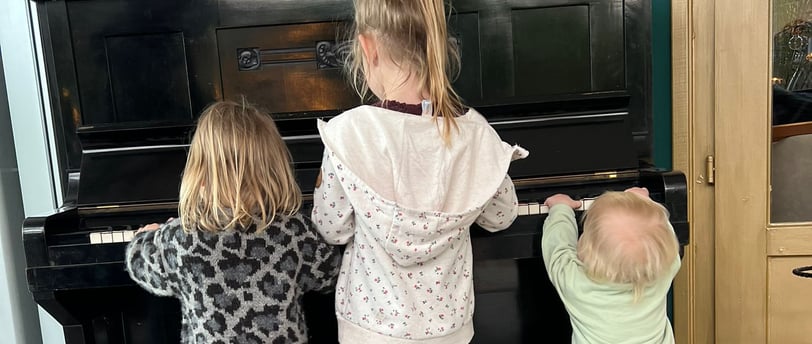 Children playing piano