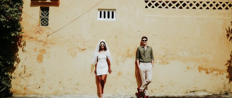 a man and woman standing next to each other