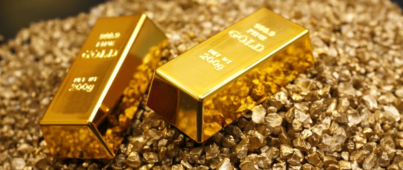 gold bullion bars in a pile
