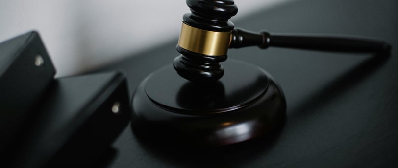 a gavel with a gavel and a gavel on a table