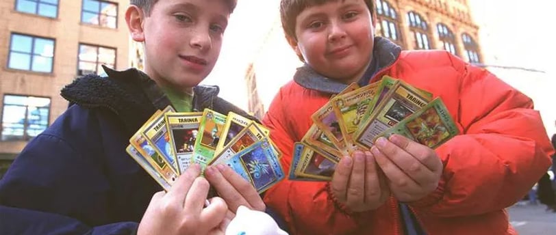 two boys holding pokemon go - go - go - go - go - go -