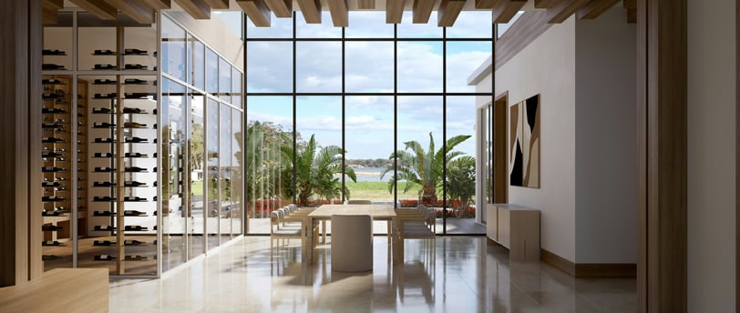 a dining room with a table and chairs