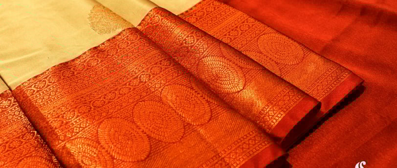 a close up of a red and white sari sari sari sari