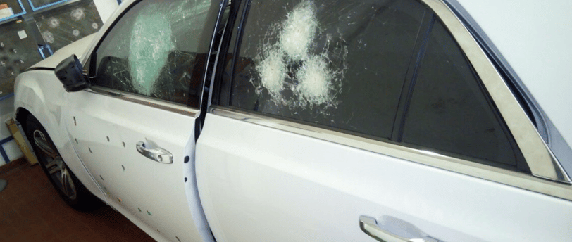 Armored Glass with Bullet Impacts – Bulletproof Vehicle Security