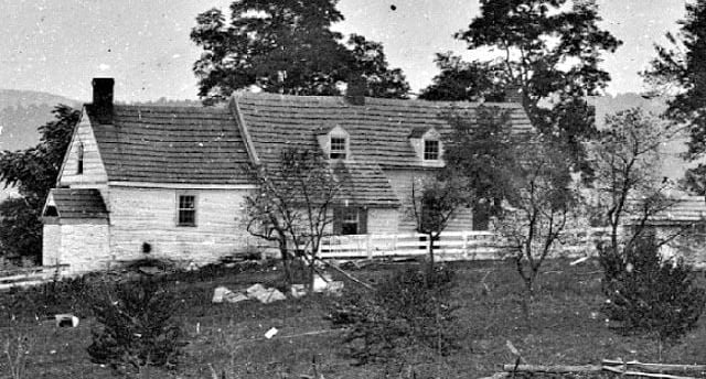 a black and white photo of the Roulette Farmhouse in Sharpsburg, MD. The Battle of Antietam