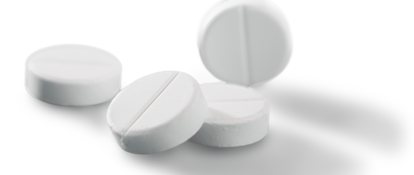 White Letrozole fertility medication pills on a white background