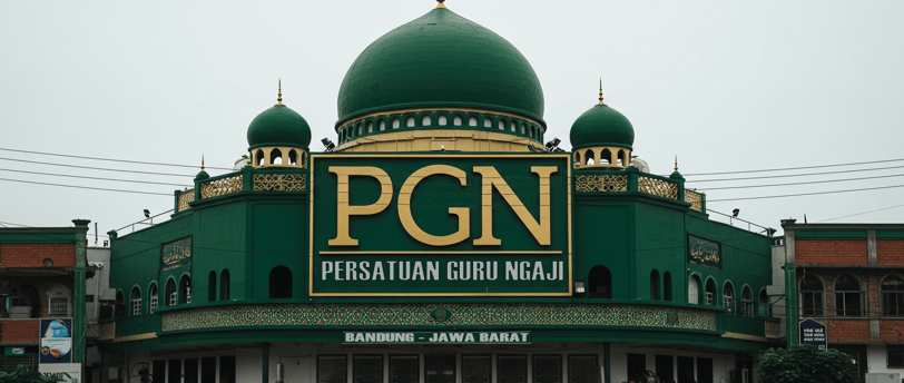 a large green building with a green dome with a green dome