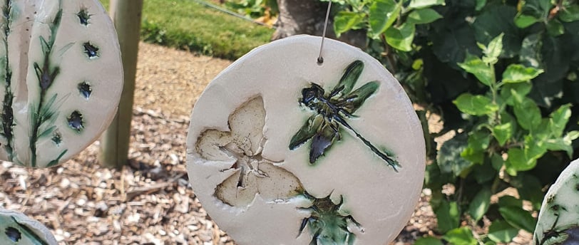 ceramic tile with insects printed and copper oxide