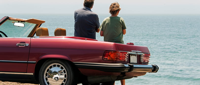 Mercedes SL parked by the ocean