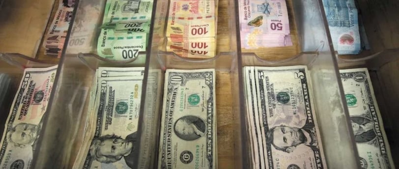 Currency Turmoil: Mexican Peso and Canadian Dollar Under Pressure Amid U.S. Tariff Threats