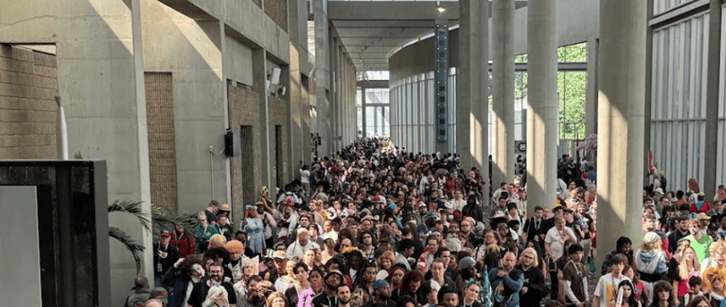 a large group of people attending a convention