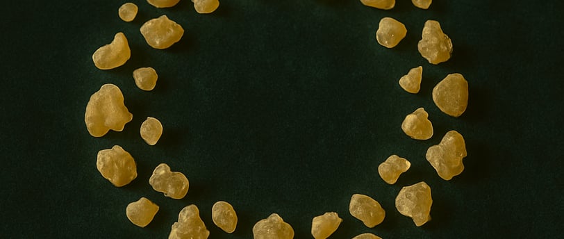 a circle of frankincense on a green background