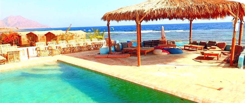 Budget friendly beach vacation pool in front of the sea in Egypt