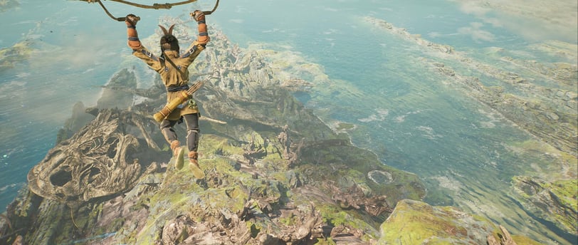 Gliding over a vast landscape, a warrior soars above ancient ruins and lush coastal terrain.