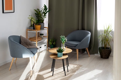 a living room with a chair and a table