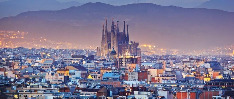 iconic sagrada familia surrounded by barcelona buildings