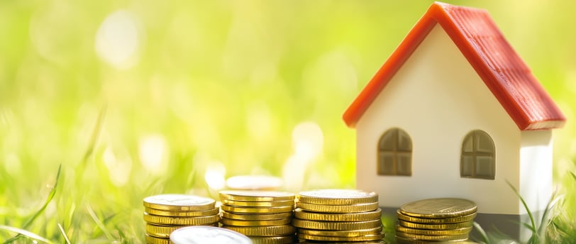 coins and a house for real estate investing