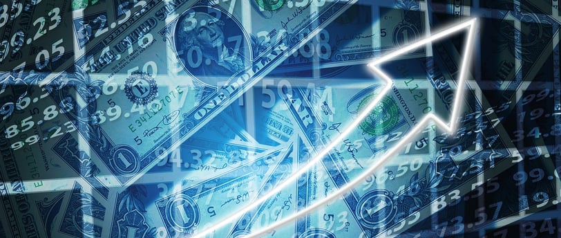 dollars bills and number symbolizing the US economy