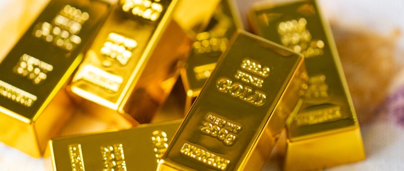 gold bars as a tangible asset example for investing
