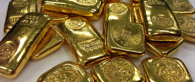 big pile of gold bullion for investing