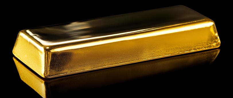 shiny gold bar on a black surface