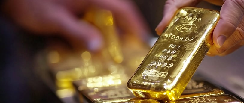 high quality gold bar being held