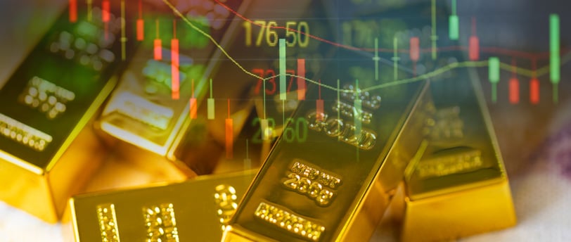gold bars with candlesticks combine for investing