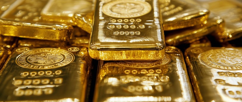 gold bullion bars in pile