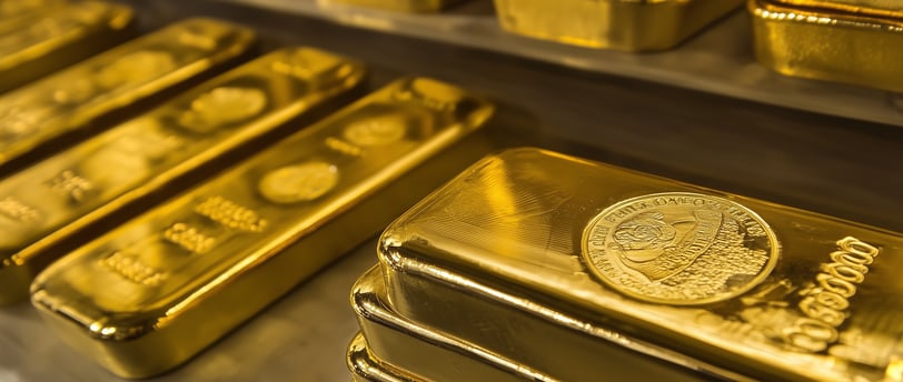 very high quality gold bars on a shelf